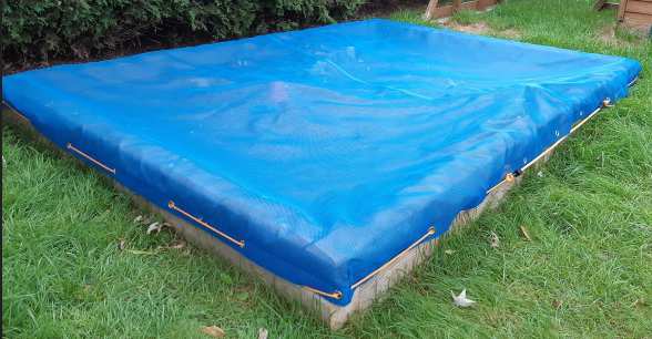 Mesh sandbox tarp