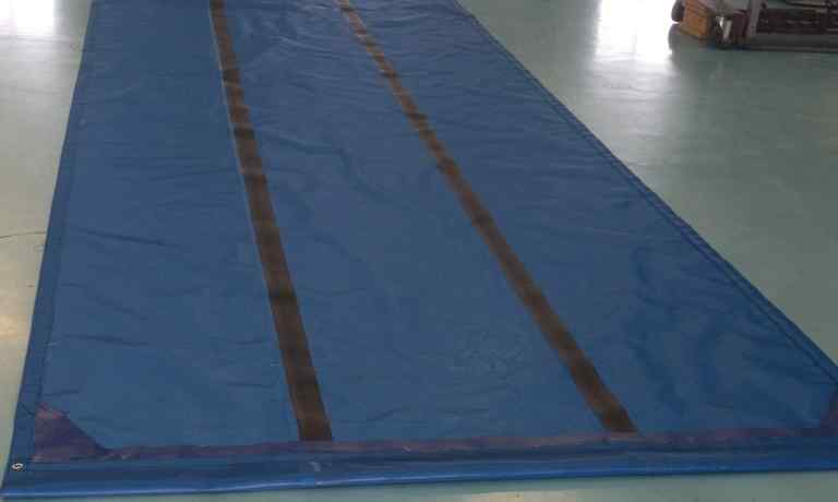 Reinforced roll tarp