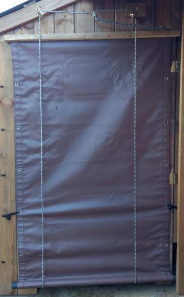 Simple roll up door mechanism