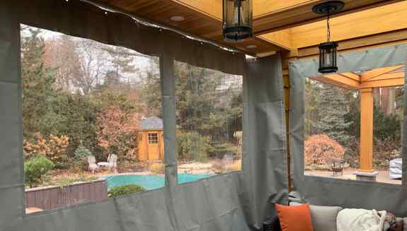 Sun room tarps to close in a deck area