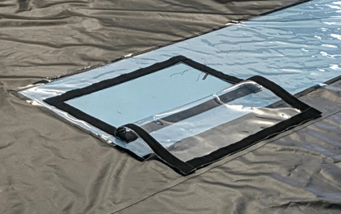 Tarp window that opens